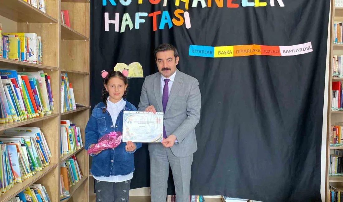 Arpaçay’da düzenlenen Kütüphane Haftası etkinliğinde en çok kitap okuyan öğrenciler
